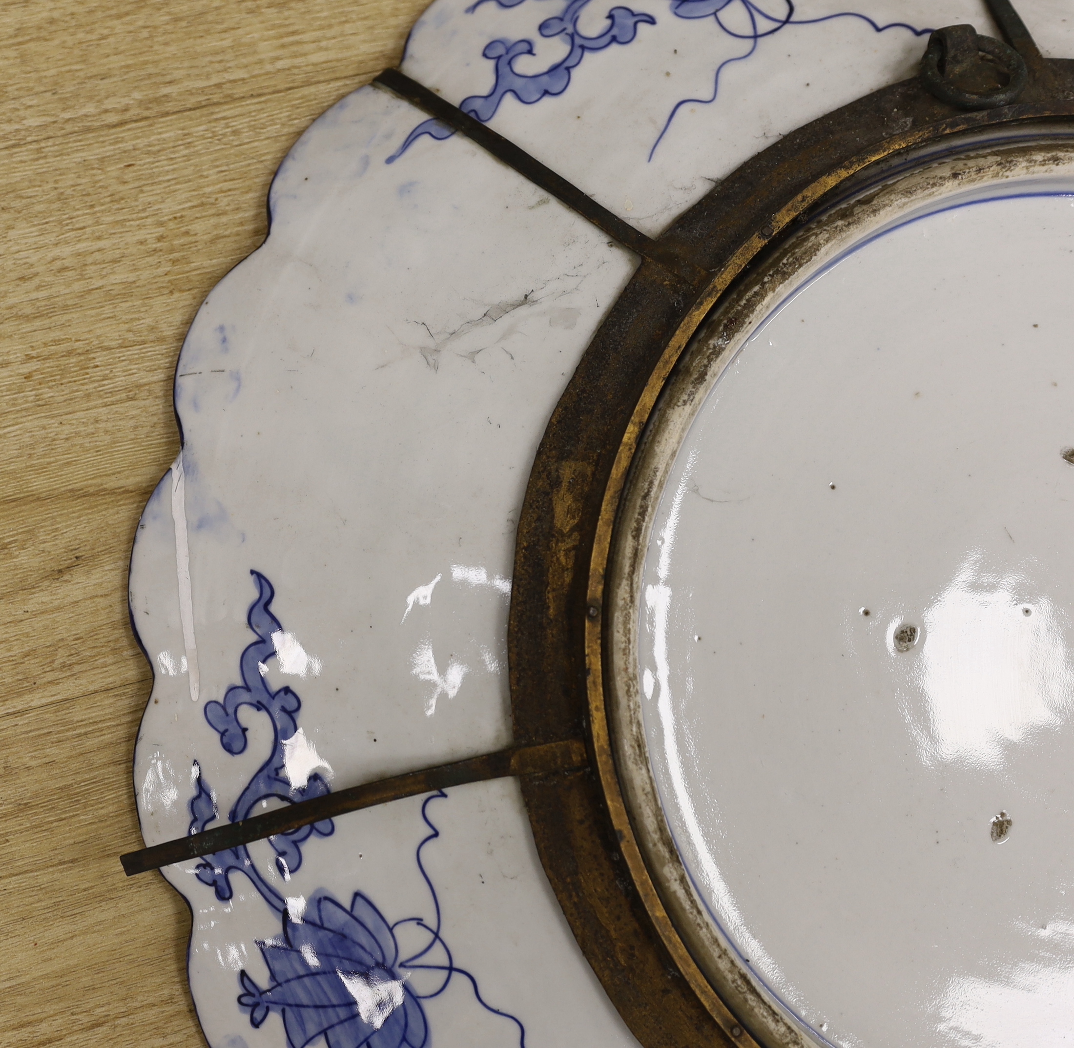 A large Japanese Imari floral charger, 58cm diameter
